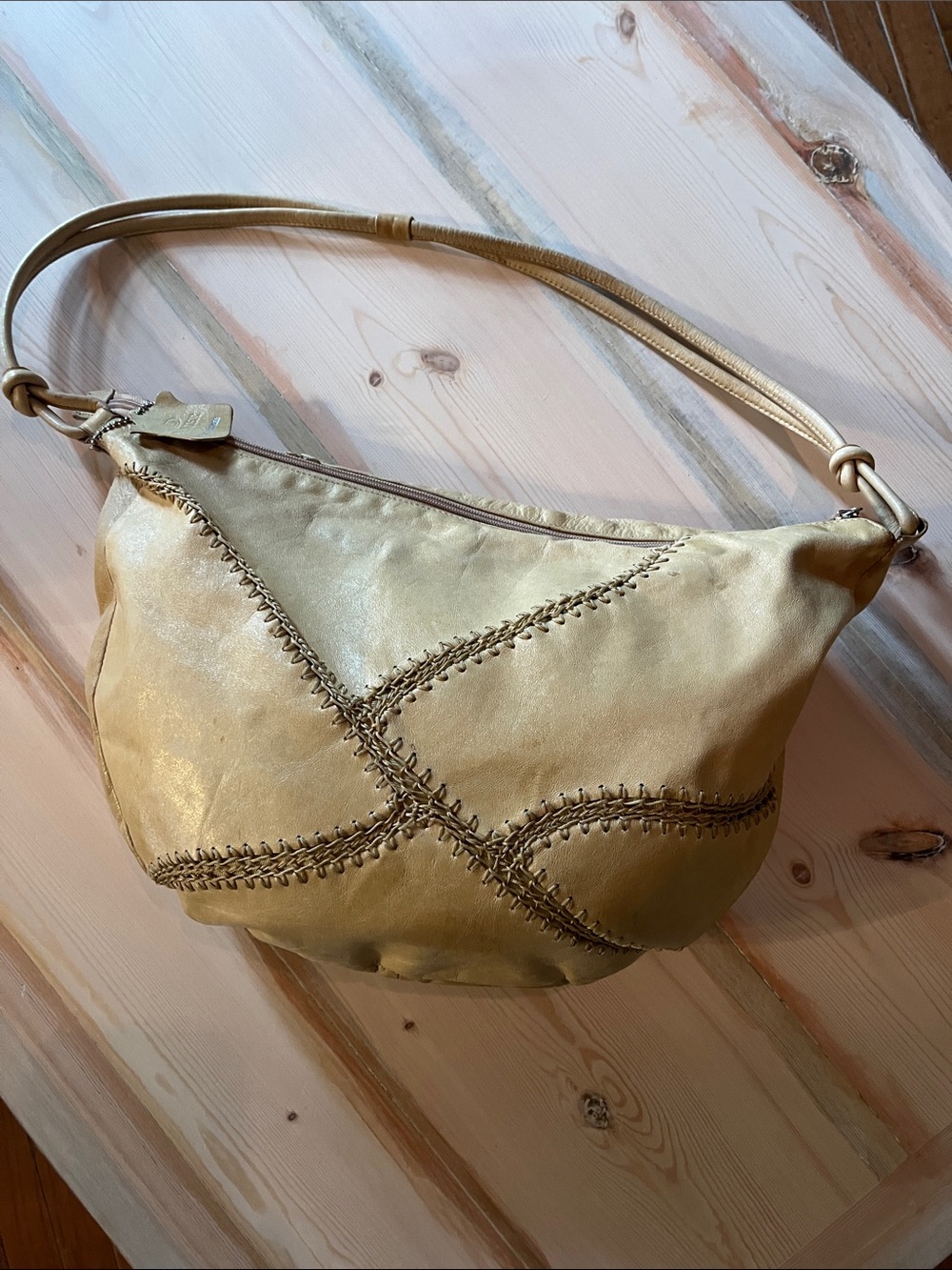 Gold Danier Leather Shoulder Bag with Decorative Stitching